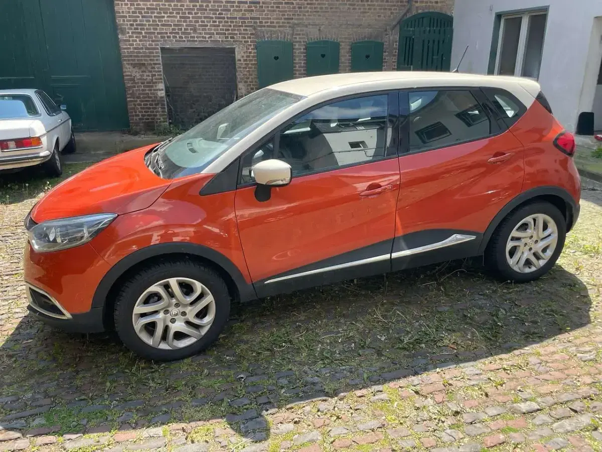 Używany Renault Captur Intens 90 KM (66 kW) 2017 Pomarańczowy SUV