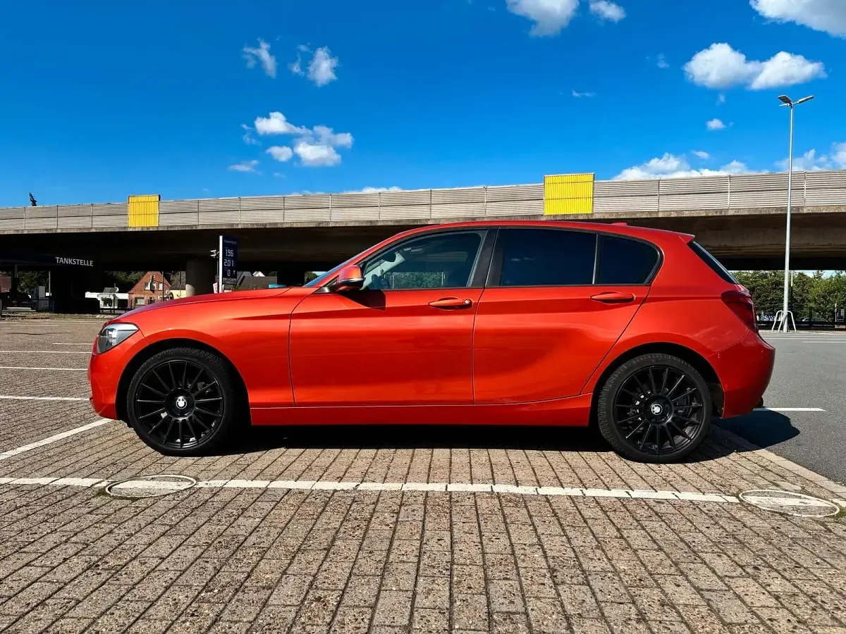 Gebraucht BMW 116 136 PS (100 kW) 2014 Orange Kleinwagen