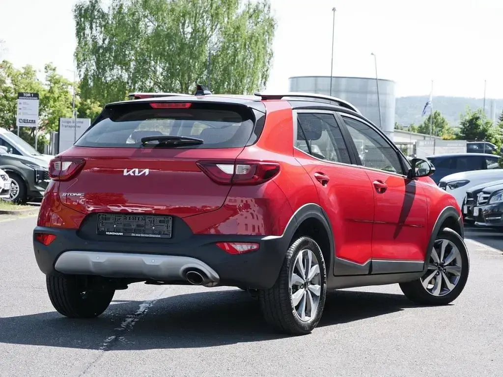 Gebraucht Kia Stonic Vision 101 PS (74 kW) 2023 Signalrot metallic SUV