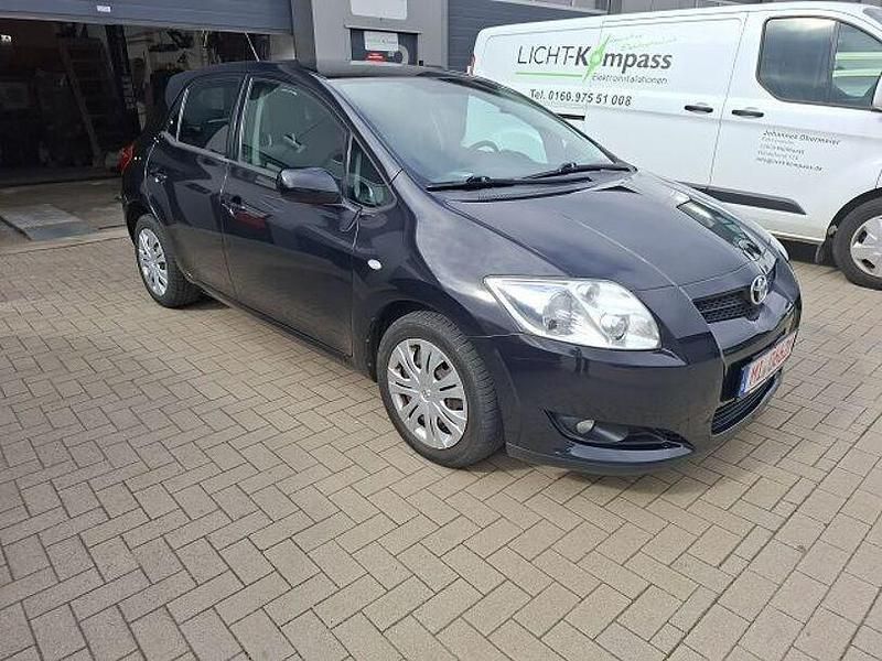 Black mica / ink Gebraucht 2009 Toyota Auris Team Limousine | 3.995 € (Fairer Preis) - Bild 1/4