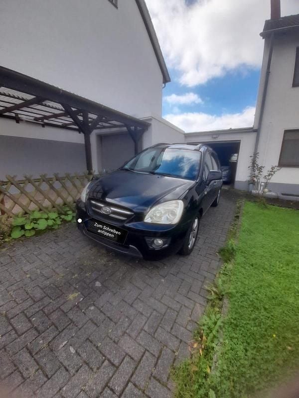 Schwarz Gebraucht 2008 Kia Carens Van / Kleinbus | 1.299 € (Superpreis) - Bild 1/4