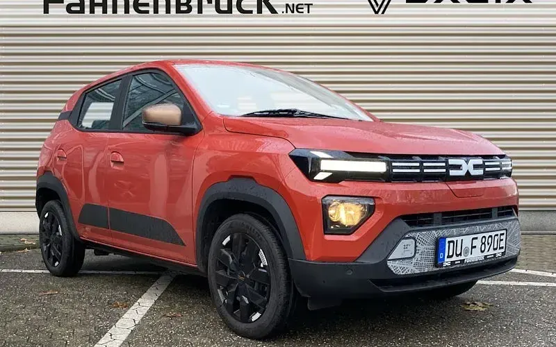 Gebraucht Dacia Spring Extreme 75 kW (102 PS) 2024 Brick red Kleinwagen