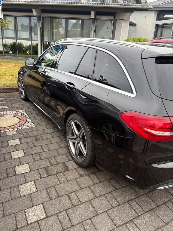 Schwarz Gebraucht 2015 Mercedes C220 AMG line Kombi | 13.900 € (Fairer Preis) - Bild 1/4