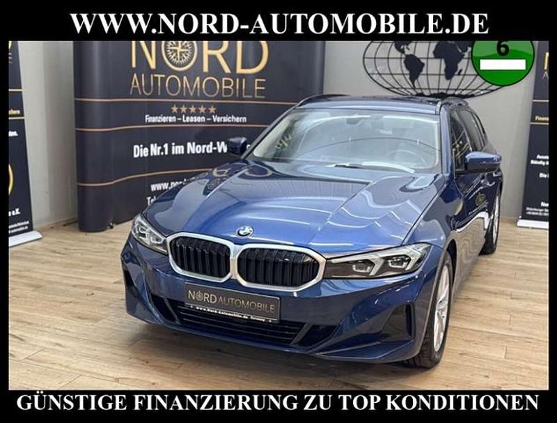 Pythonicblau metallic (metallic) Gebraucht 2023 BMW 320 Shadowline Kombi | 27.400 € (Superpreis) - Bild 1/3