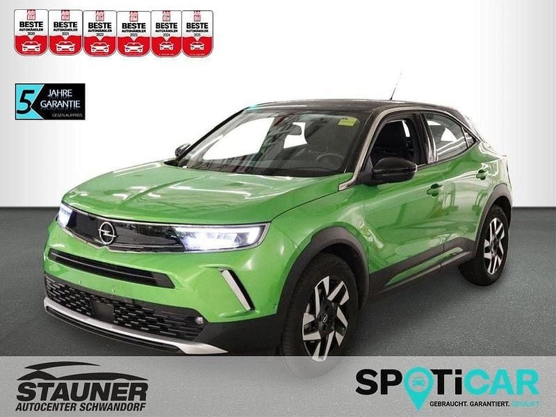 Grün Gebraucht 2023 Opel Mokka-e Elegance SUV | 17.480 € (Superpreis) - Bild 1/4