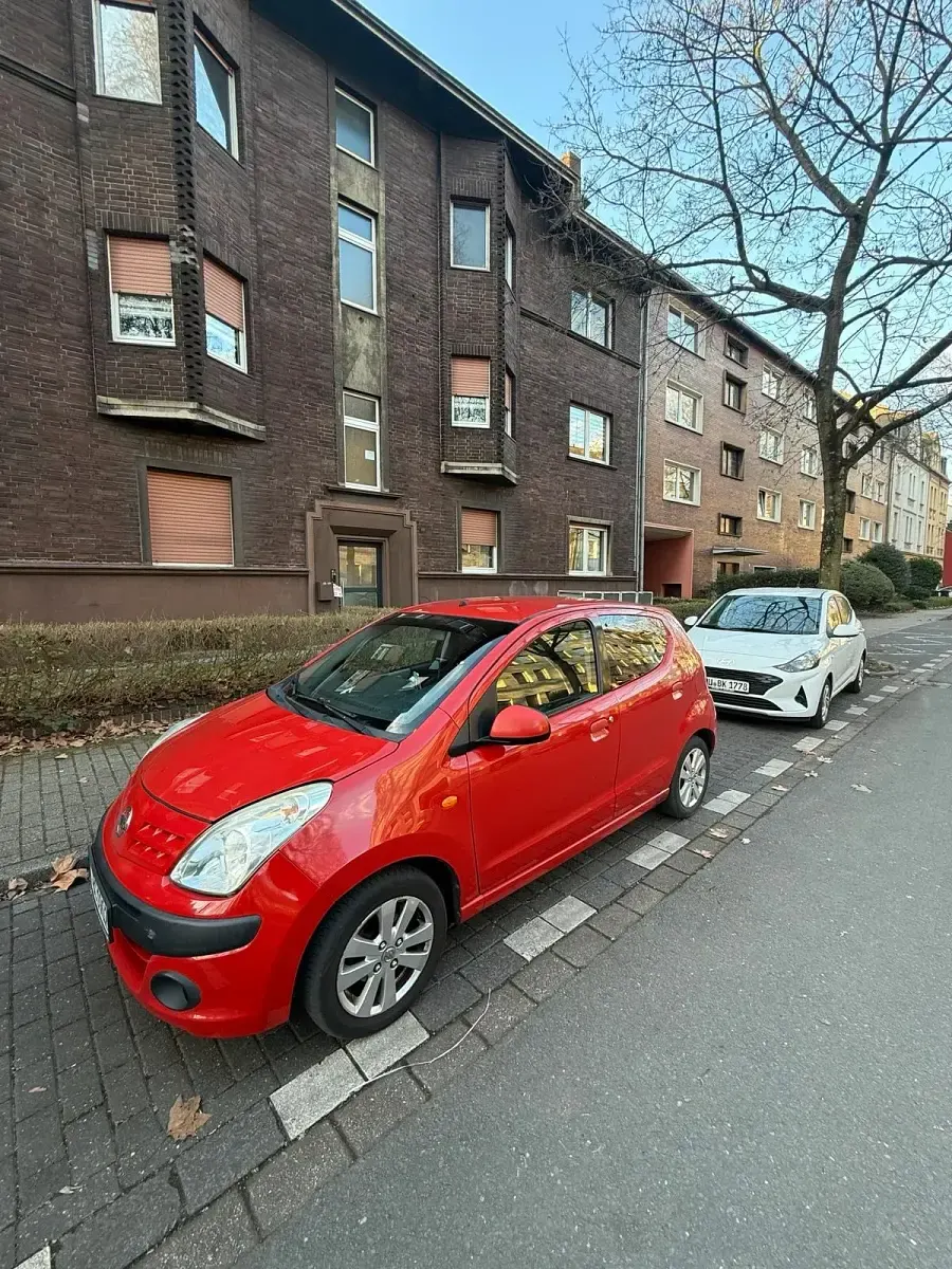 Gebraucht Nissan Pixo 68 PS (50 kW) 2012 Rot Kleinwagen