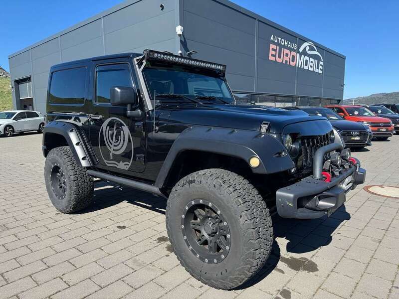 Black clear coat Gebraucht 2017 Jeep Wrangler Sahara SUV | 41.870 € (Teuer) - Bild 1/4