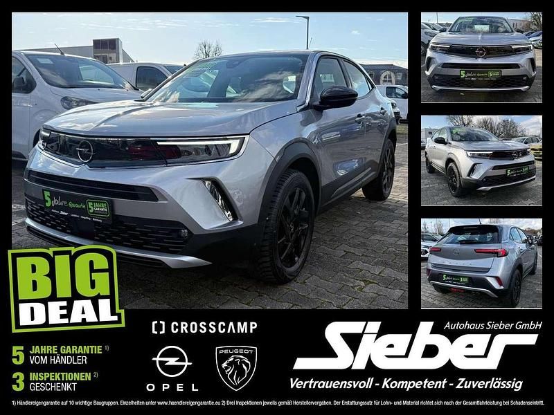 Gebraucht Opel Mokka Elegance 131 PS (96 kW) 2022 Kontrast grau/quarz silber SUV