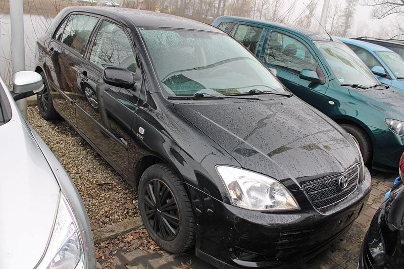 Gebraucht Toyota Corolla Sol 97 PS (71 kW) 2004 Black mica / ink Limousine