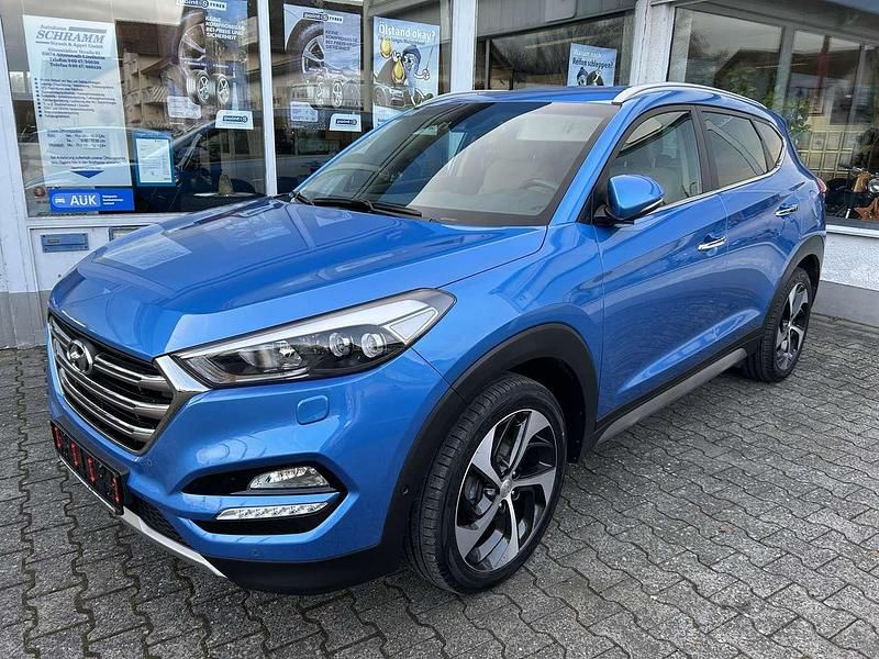 Blau Gebraucht 2017 Hyundai Tucson Premium SUV | 18.950 € (Fairer Preis) - Bild 1/4
