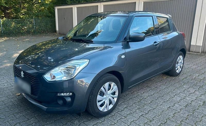 Grau Gebraucht 2017 Suzuki Swift Limousine | 11.900 € (Fairer Preis) - Bild 1/4