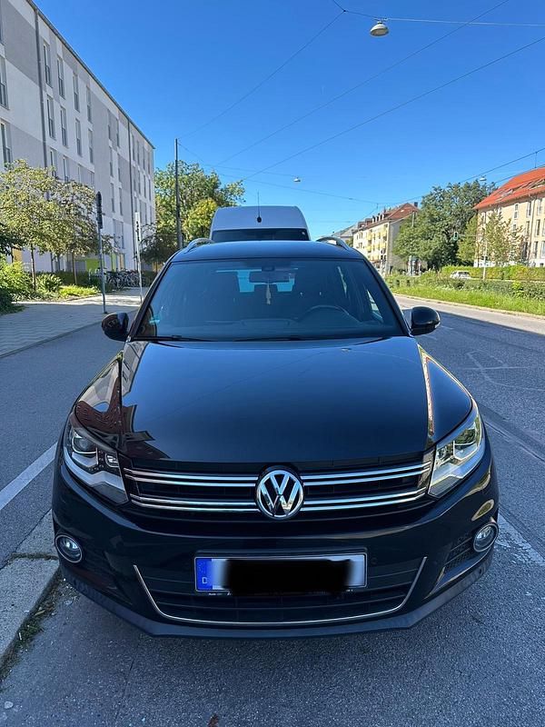 Gebraucht VW Tiguan Cup 122 PS (89 kW) 2014 Schwarz SUV