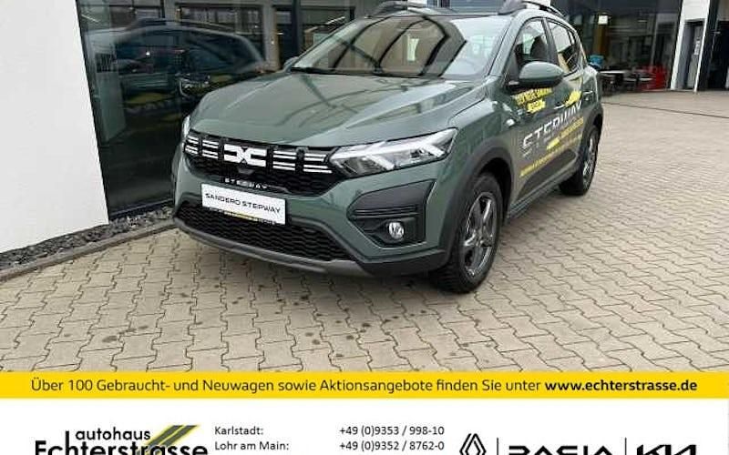 Gebraucht Dacia Sandero Expression 91 PS (66 kW) 2024 Safarigrüngrau Kleinwagen