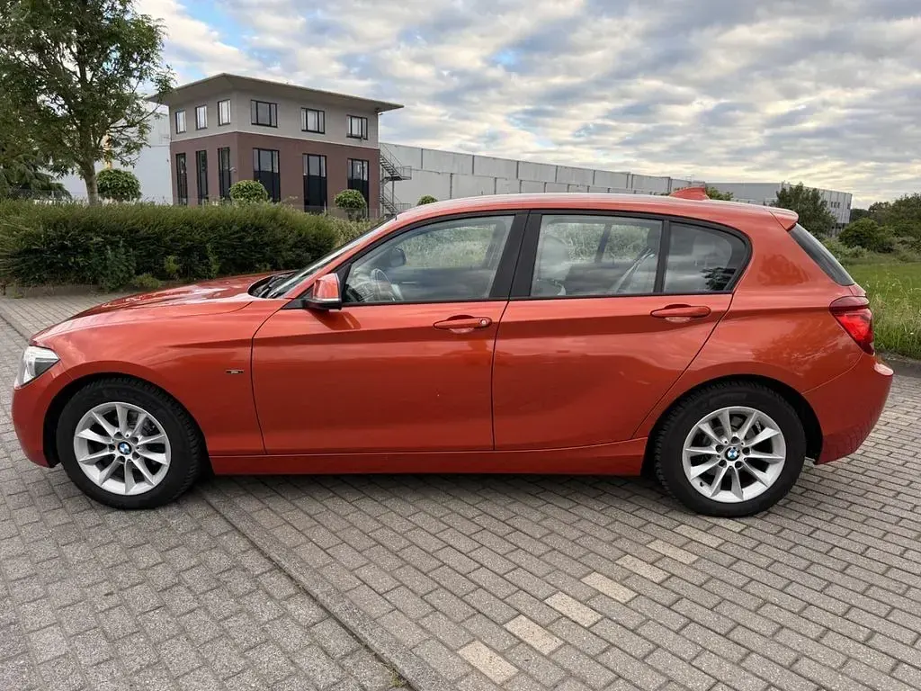 Gebraucht BMW 118 143 PS (105 kW) 2013 Orange Kleinwagen