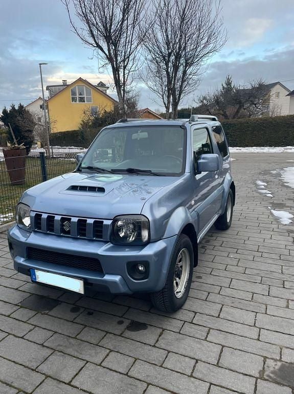 Blau Gebraucht 2014 Suzuki Jimny Style SUV | 13.333 € (Guter Preis) - Bild 1/4
