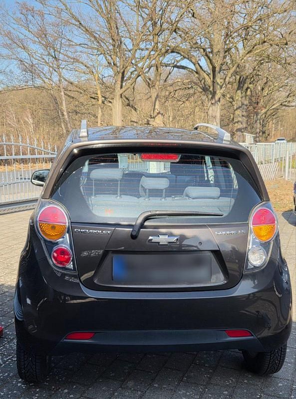 Gebraucht Chevrolet Spark 81 PS (59 kW) 2011 Schwarz Kleinwagen