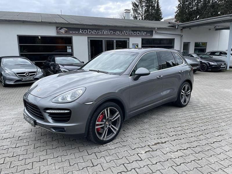 Grau (metallic) Gebraucht 2011 Porsche Cayenne Turbo SUV | 19.850 € (Guter Preis) - Bild 1/4
