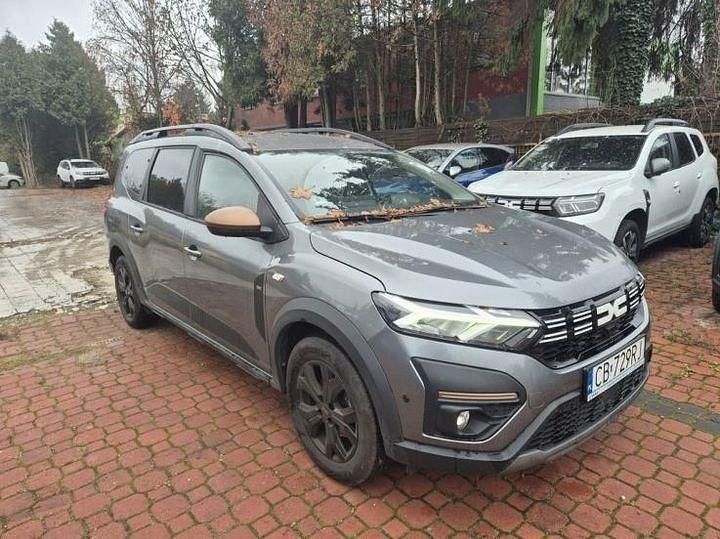 Grau Gebraucht 2024 Dacia Jogger Extreme Van / Kleinbus | 15.500 € (Superpreis) - Bild 1/4