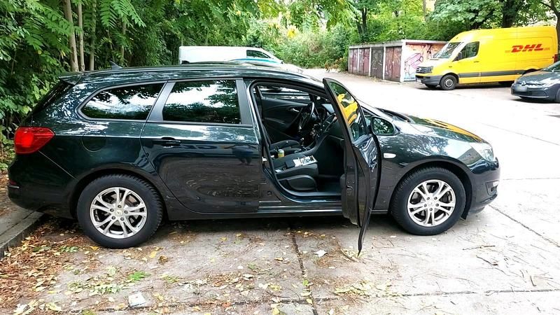 Gebraucht Opel Astra 136 PS (100 kW) 2014 Schwarz Kombi