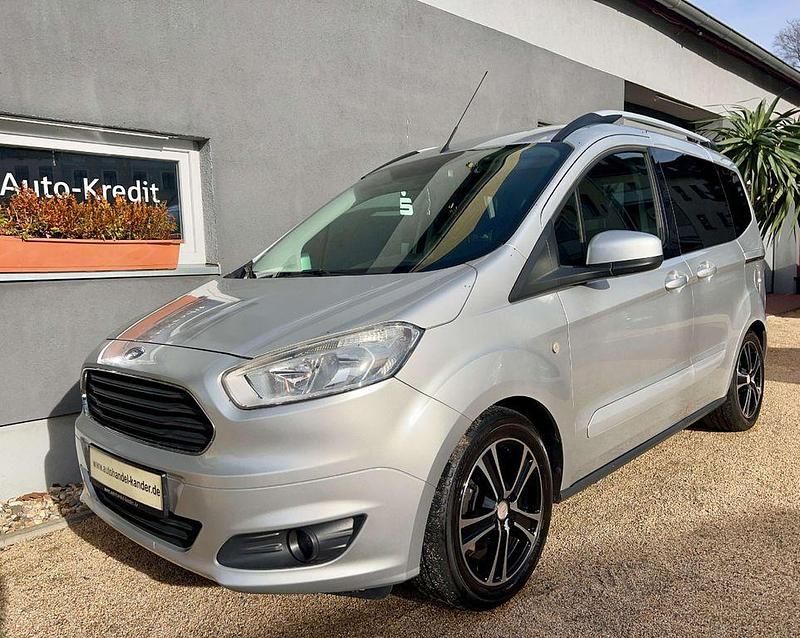 Silber Gebraucht 2015 Ford Tourneo Courier Titanium Van / Kleinbus | 6.999 € (Fairer Preis) - Bild 1/4