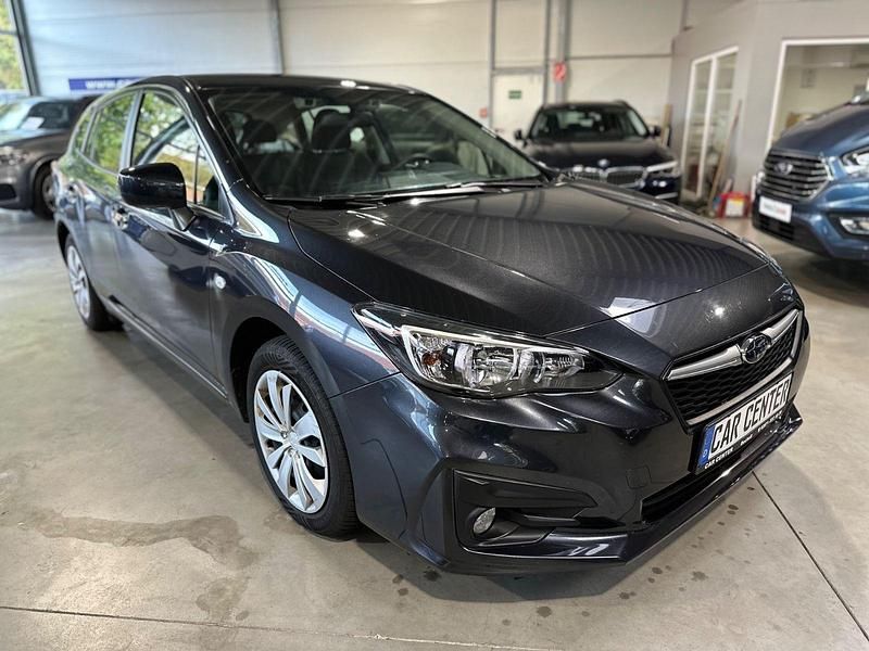 Grau Gebraucht 2017 Subaru Impreza Trend Limousine | 13.950 € - Bild 1/4
