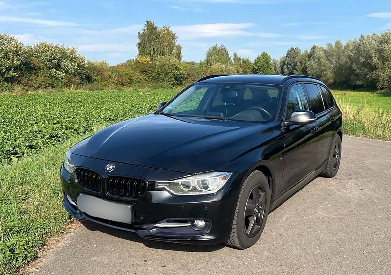 Schwarz Gebraucht 2014 BMW 320 Kombi | 9.750 € (Guter Preis) - Bild 1/4