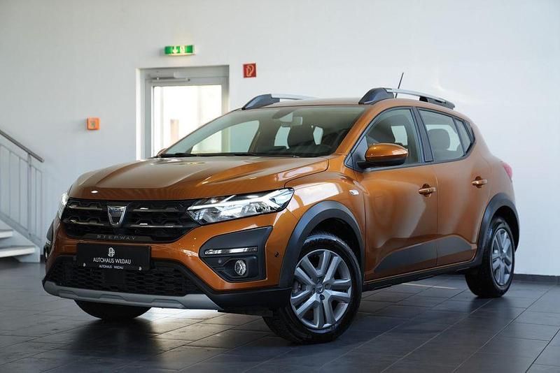 Atacamaorange Gebraucht 2023 Dacia Sandero Comfort Kleinwagen | 15.990 € (Fairer Preis) - Bild 1/4