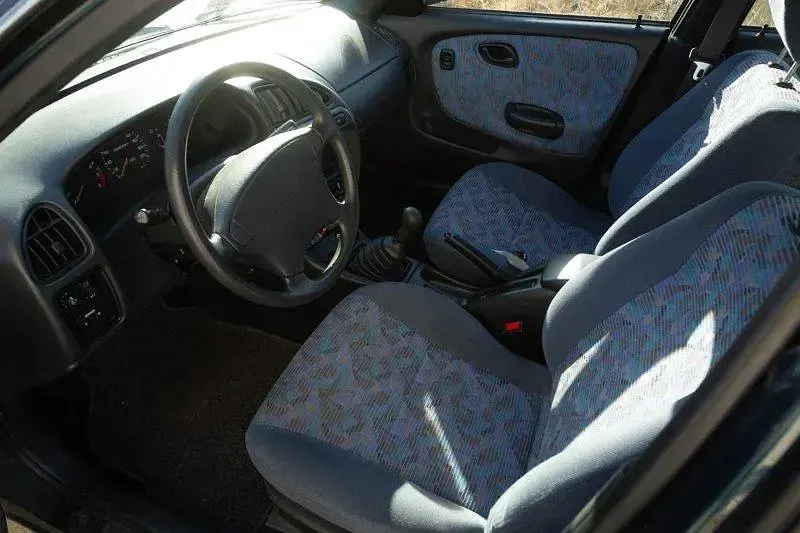 Gebraucht Suzuki Baleno 85 PS (62 kW) 1997 Grün Limousine