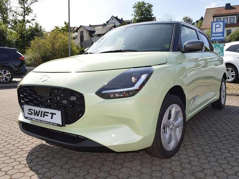Cool yellow / mineral gray Neu 2025 Suzuki Swift Comfort Kleinwagen | 21.990 € - Bild 1/4