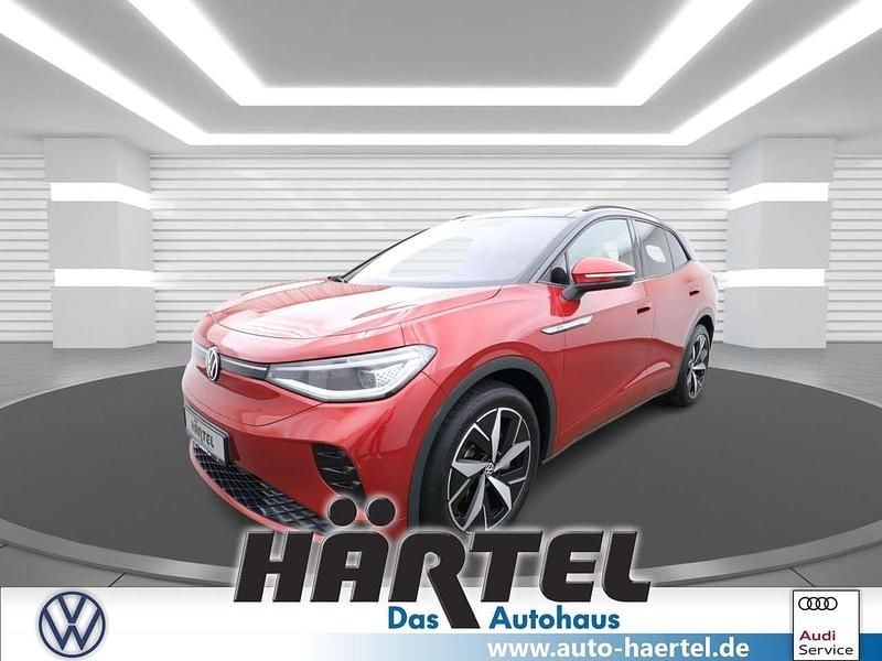 Kings red, metallic Gebraucht 2021 VW ID.4 GTX SUV | 32.400 € (Fairer Preis) - Bild 1/4
