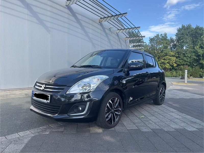 Schwarz Gebraucht 2015 Suzuki Swift X-TRA Kleinwagen | 7.700 € (Fairer Preis) - Bild 1/4