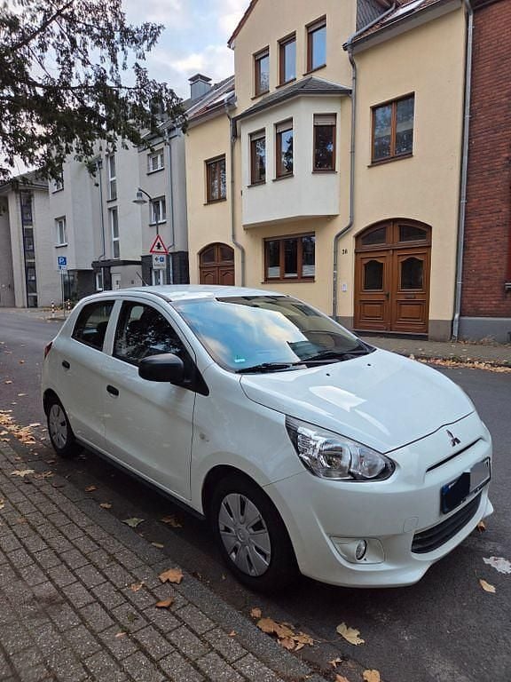 Gebraucht Mitsubishi Space Star 71 PS (52 kW) 2015 Weiß Limousine