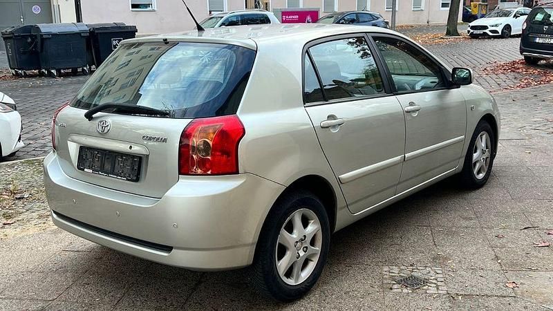 Gebraucht Toyota Corolla 97 PS (71 kW) 2006 Gold Limousine