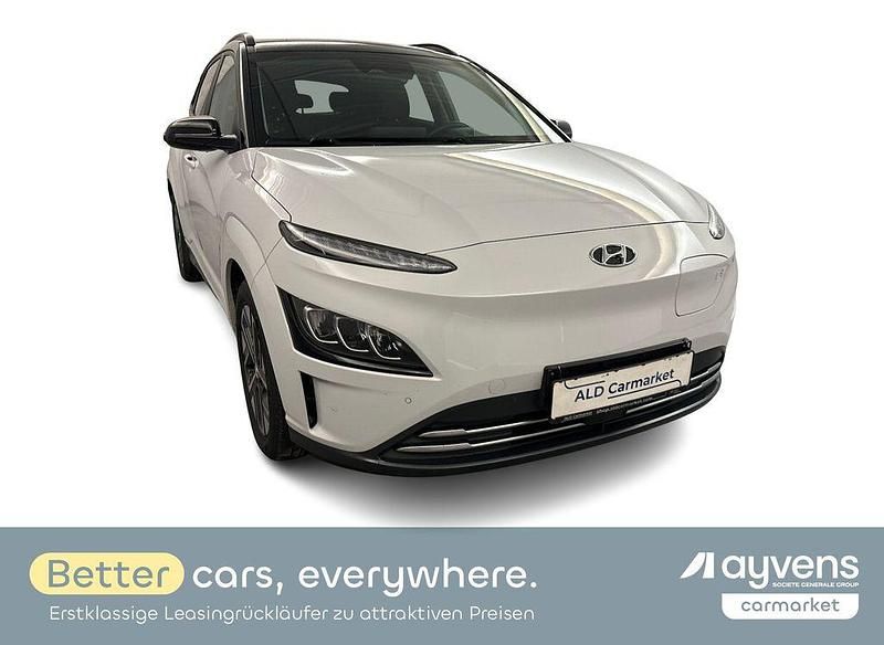 Lackierung: chalk white Gebraucht 2021 Hyundai Kona Prime SUV | 22.480 € (Fairer Preis) - Bild 1/4