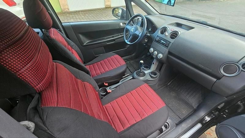Gebraucht Mitsubishi Colt Motion 95 PS (69 kW) 2006 Schwarz Kleinwagen