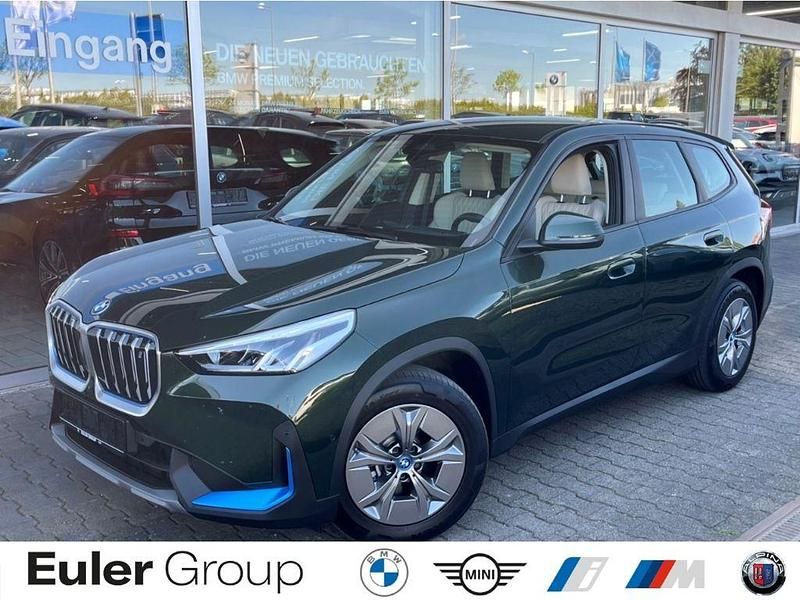 Gruen Gebraucht 2023 BMW iX1 Performance SUV | 34.949 € (Superpreis) - Bild 1/3