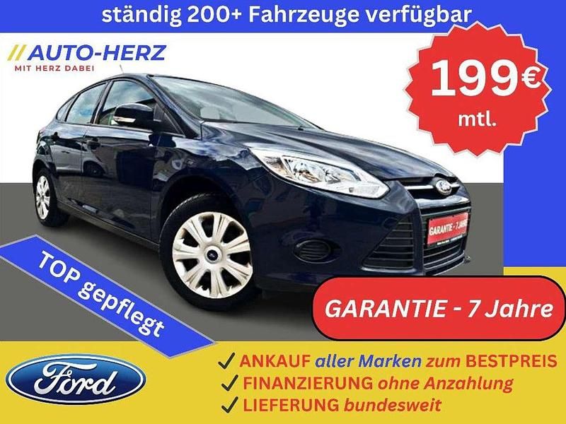 Blau Gebraucht 2014 Ford Focus Limousine | 7.880 € (Fairer Preis) - Bild 1/3