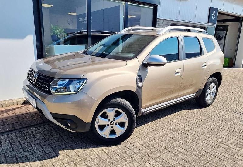 Dünenbeige (metallic) Gebraucht 2018 Dacia Duster Comfort SUV | 11.950 € (Fairer Preis) - Bild 1/4