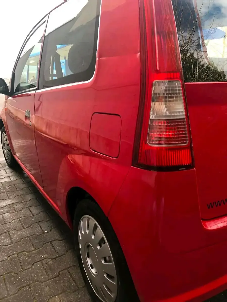 Gebraucht Daihatsu Cuore 54 PS (39 kW) 2004 Rot Kleinwagen