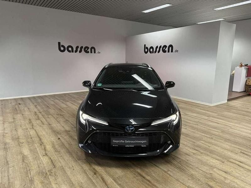 Mysticschwarz mica Gebraucht 2021 Toyota Corolla Team Kombi | 21.990 € (Guter Preis) - Bild 1/4