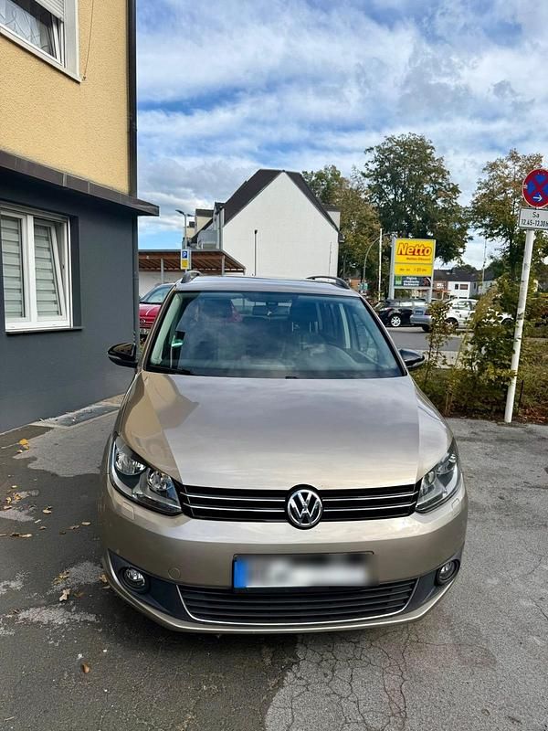 Braun Gebraucht 2012 VW Touran Van / Kleinbus | 8.000 € (Fairer Preis) - Bild 1/4