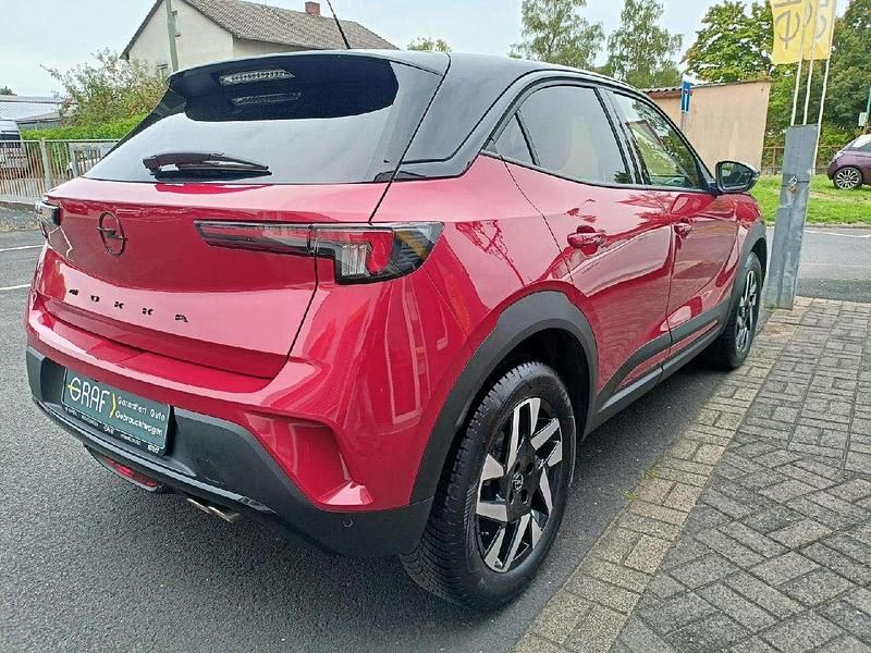 Gebraucht Opel Mokka 131 PS (96 kW) 2024 Rubin rot / dach schwarz SUV