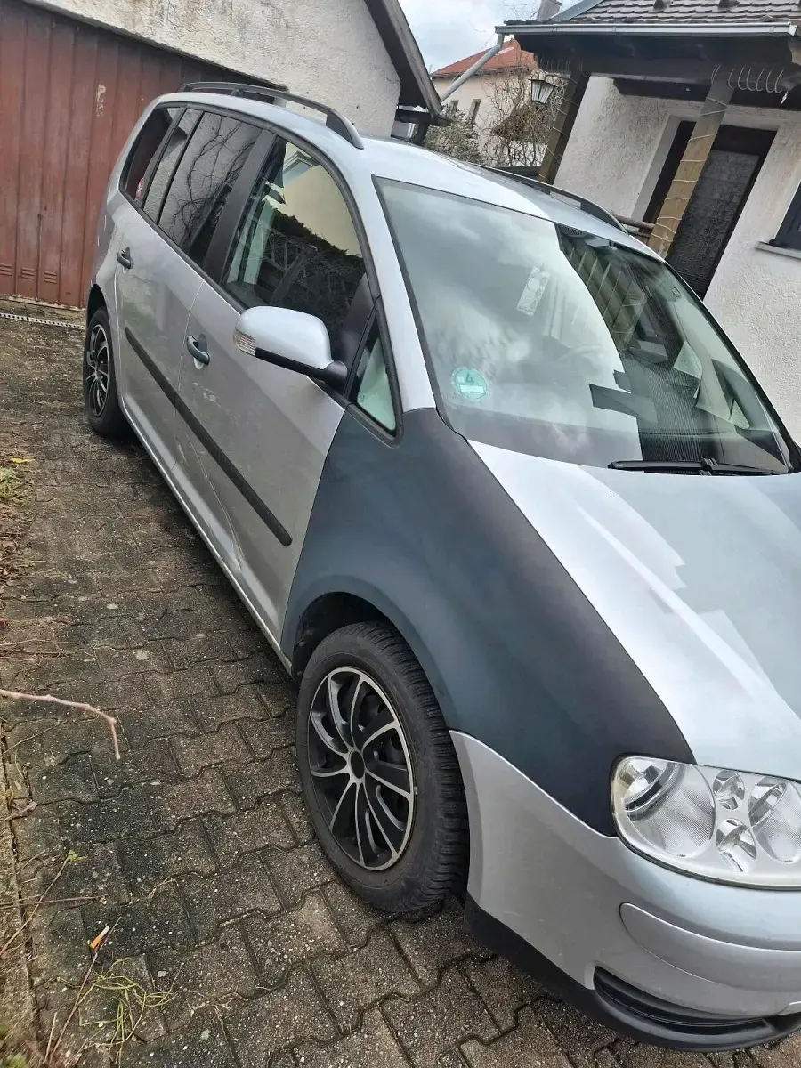Używany VW Touran 115 KM (84 kW) 2003 Srebrny Minivan