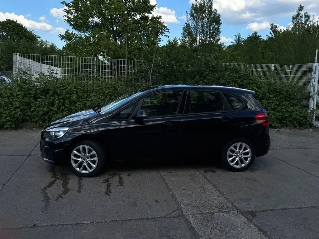 Używany BMW 218 Active Tourer Advantage 150 KM (110 kW) 2014 Czarny Minivan