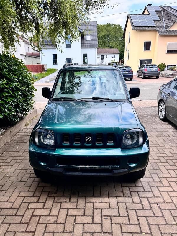 Grün Gebraucht 2002 Suzuki Jimny SUV | 6.500 € (Fairer Preis) - Bild 1/4