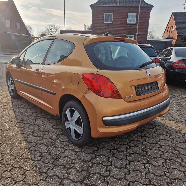 Gebraucht Peugeot 207 Tendance 88 PS (64 kW) 2006 Orange Kleinwagen