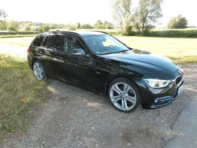Gebraucht BMW 330 Sport Line 258 PS (189 kW) 2016 Schwarz Kombi