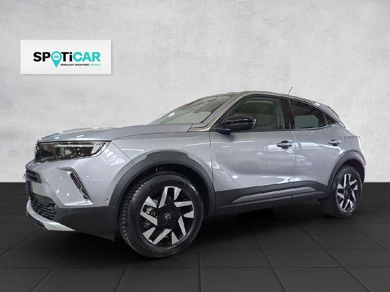 Quarz silber Gebraucht 2022 Opel Mokka-e Elegance SUV | 19.980 € (Fairer Preis) - Bild 1/4