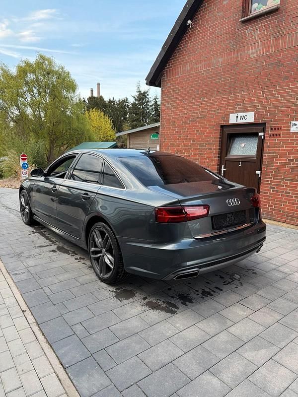 Używany Audi A6 S-Line 218 KM (160 kW) 2016 Czarny Sedan/Limuzyna