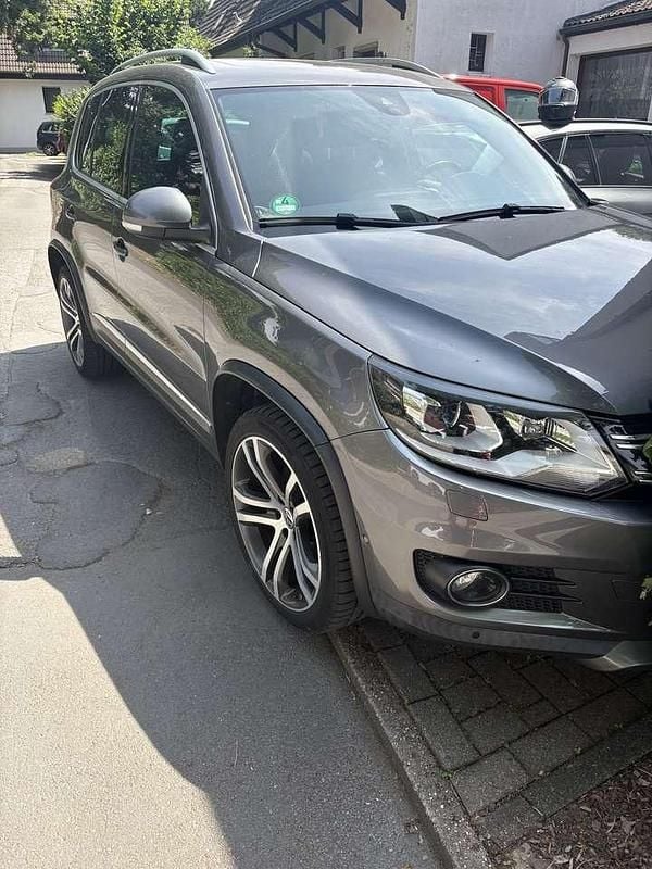Grau Gebraucht 2013 VW Tiguan Sportline SUV | 9.980 € (Fairer Preis) - Bild 1/4